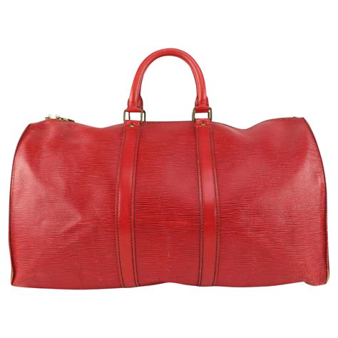 louis vuitton duffle bag red strap|louis vuitton duffle bag women's.